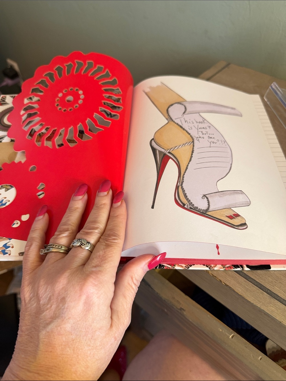 Christian Louboutin White Notebook with Red, Orange, Brown, and Black Accents - Picture 6 of 7